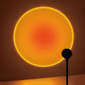 Sunset Projection Lamp projecting a sunset glow across a wall