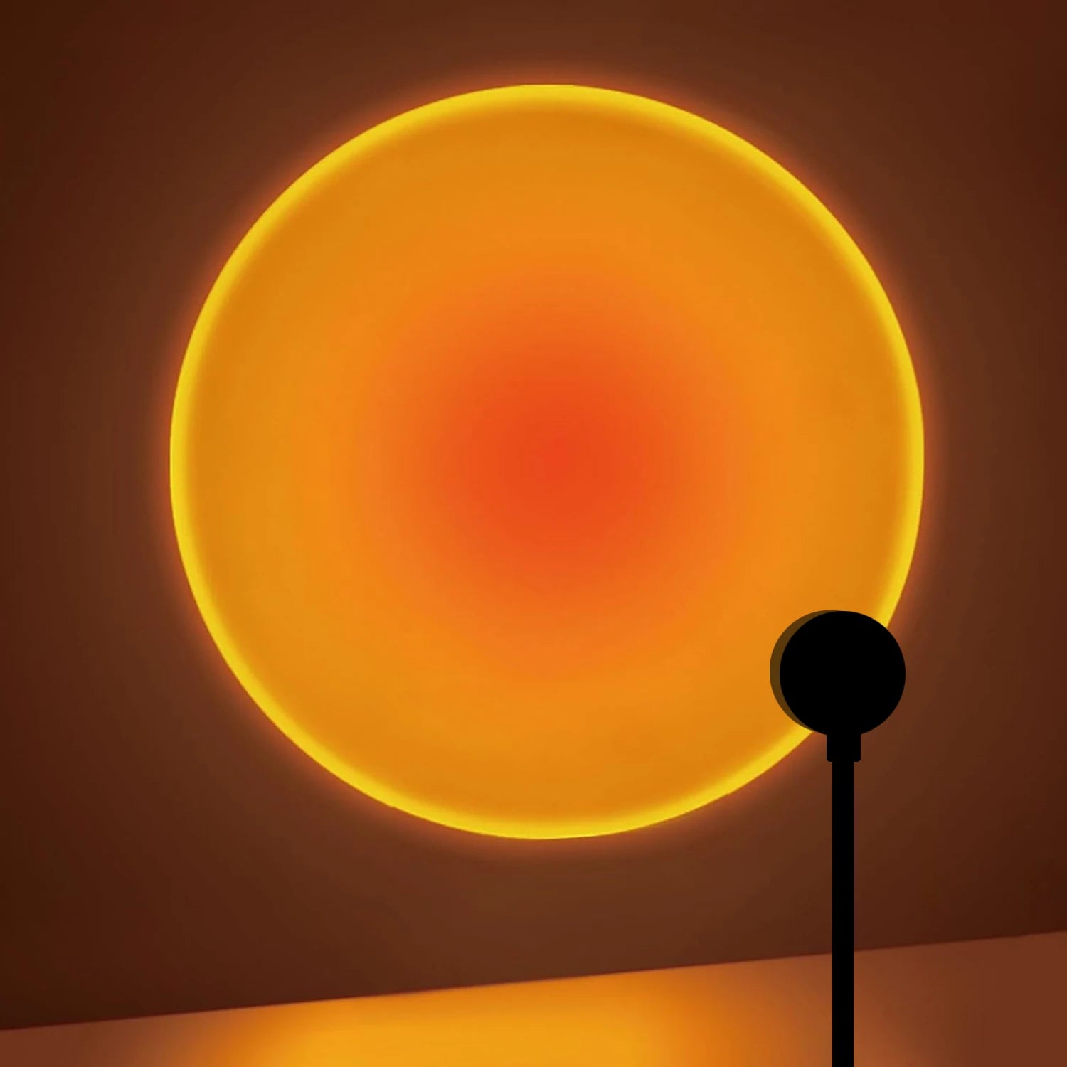 Sunset Projection Lamp projecting a sunset glow across a wall